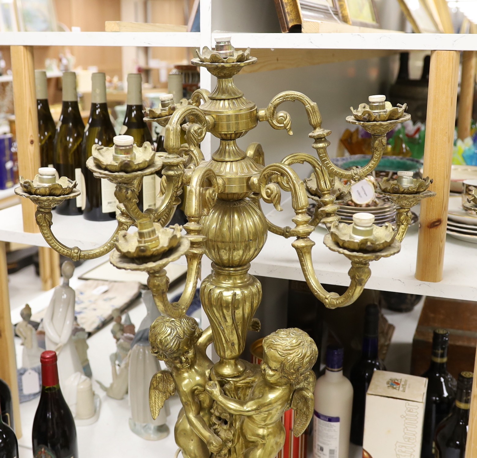 A pair of heavy brass candelabra, 85cm total height
